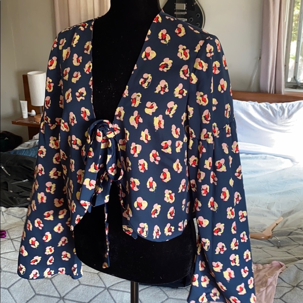 BCBGeneration Wrap Top with flowers